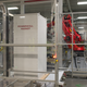 A robot making Powerwalls inside the Gigafactory. Photo credit: Michael Ballaban/Jalopnik